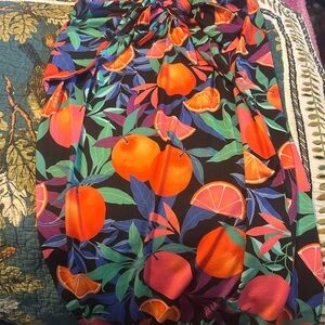Nina Parker Colorful Leaf Print skirt with front tie.